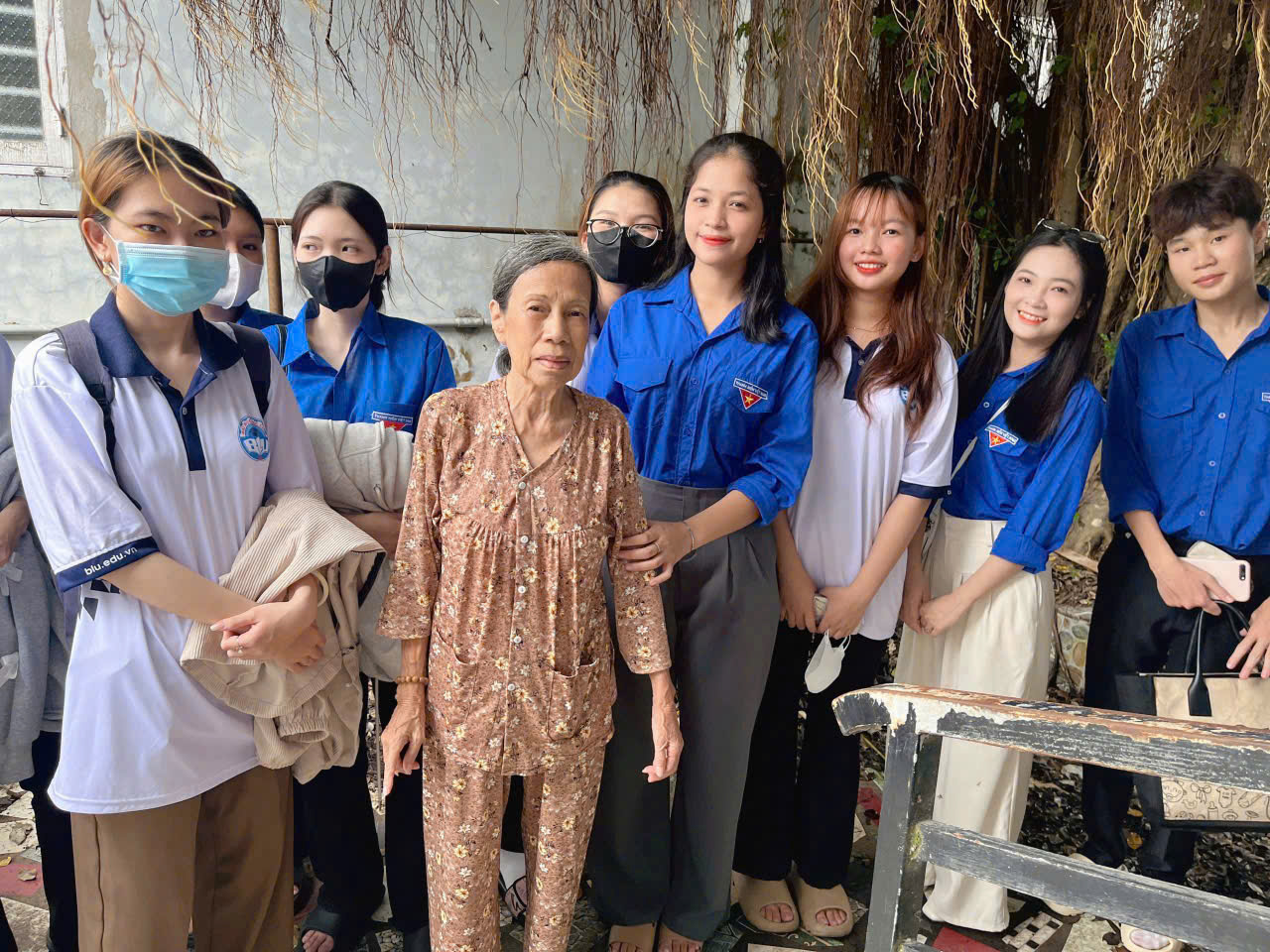 A group of people posing for a photoAI-generated content may be incorrect.